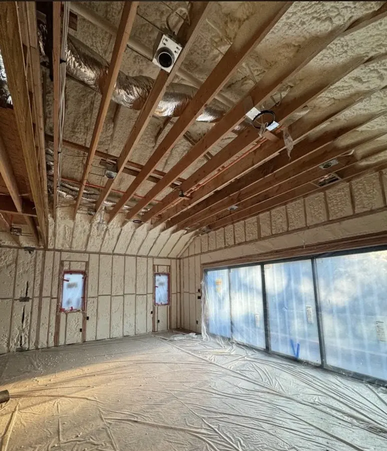 Interior walls and ceiling insulated with spray foam during new construction in Charlton